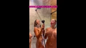 3 Lesbian Babes having fun in the shower ( watch full videos on cumcorder.com )