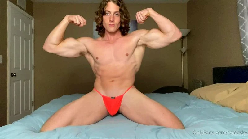 Little Muscle Showing Off On Bed