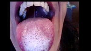 Skinny MILF Shows Tongue w/ Spit + Dildo BJ