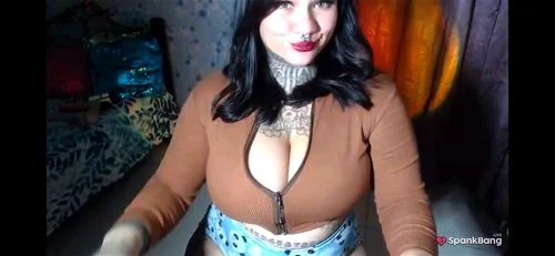 Big tit goth latina cam girl flaunting her goods.