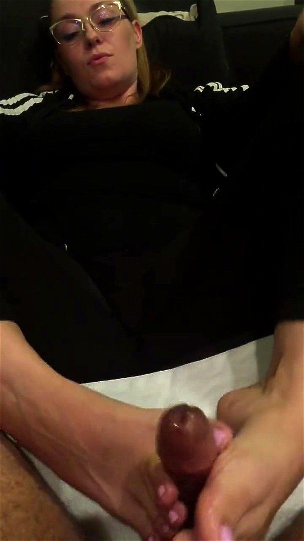 Hot wife gives me a footjob Hot wife gives me a footjob