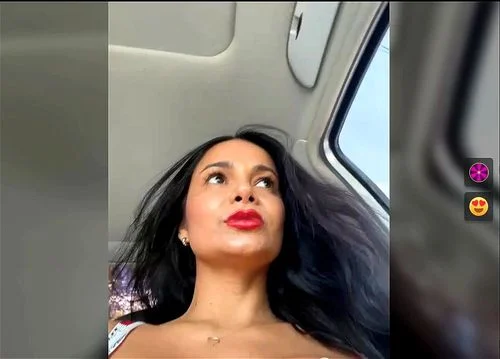 CataleyaRusso using a red VS shiny bra show tits inside car
