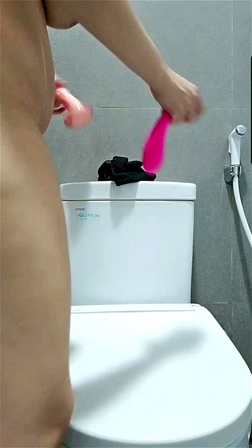 milky breasts masturbating in a public restroom