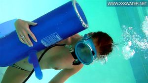 Hungarian beauty fucks dildo underwater