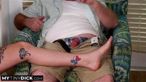 Rubbing a hot blonde's feet before showing her his pathetic little penis Rubbing a hot blonde's feet before showing her his pathetic little penis