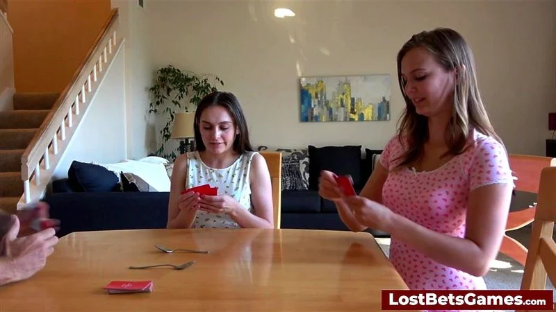 A relaxed strip card spoons game with two eager hotties