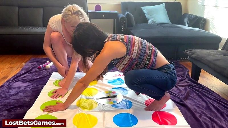 A sexy twister strip game with a lesbian couple