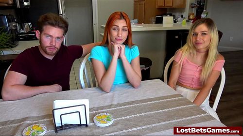 A redhead and a blonde lose a strip game and fuck the male winner