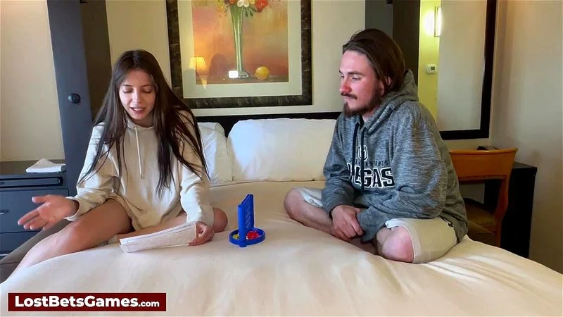 Playing a strip Connect 4 on the bed and losing all clothes in the process