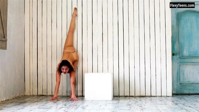 Talented naked gymnast Kim Nadara spreading legs Talented naked gymnast Kim Nadara spreading legs