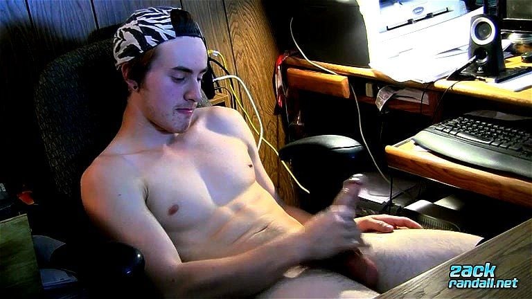 Toned Ty Evans jacks his cock off in front of his computer