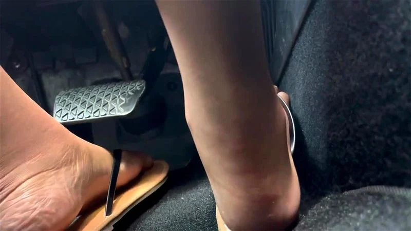 Ebony Feet While Driving a Car