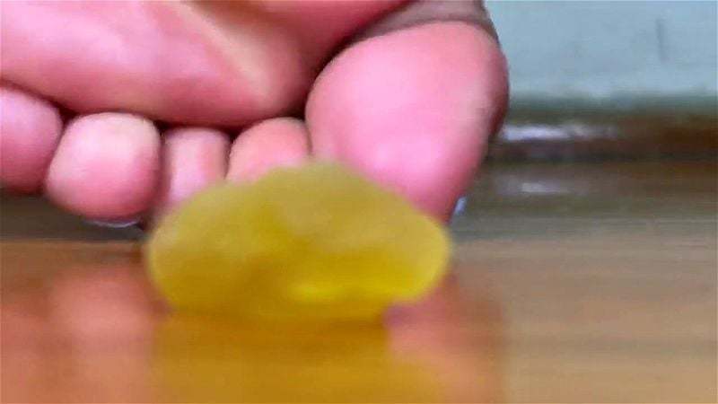 Ebony Giantess Stomps Gummy Bears with Her Feet