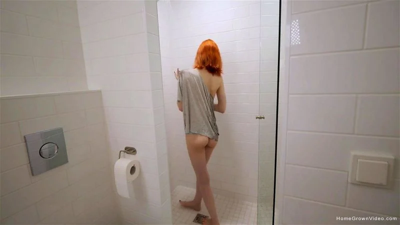 Redhead with a perfect tight body fucked in the shower