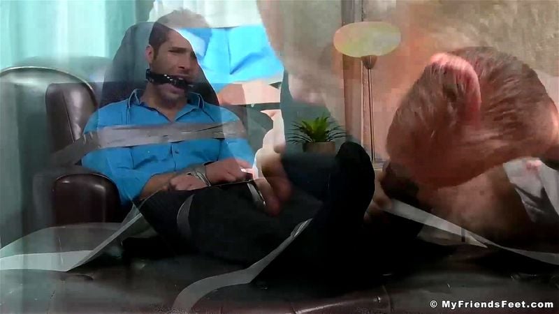 Business man Blayne tied up with duct tape and feet licked Business man Blayne tied up with duct tape and feet licked
