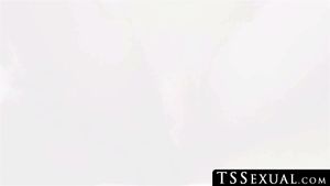 TSSexual.com - Two stunning tranny babes engage in a wild interracial anal fuck