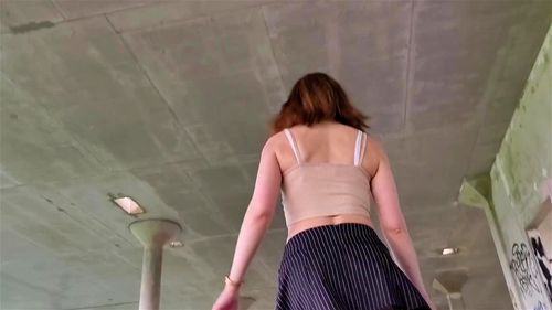 Walking around the city the view from under her skirt.