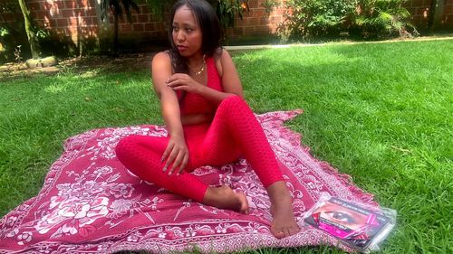 Sexy brunette exercising in the park outdoors