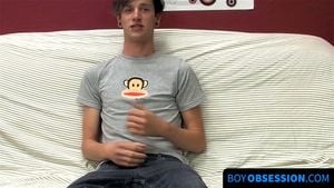 Adorable Danny's solo couch wank and cumshot fun during interview