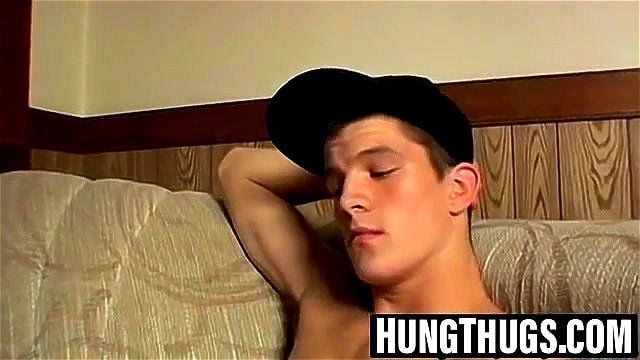 Jock flexes muscles while pumping hard cock