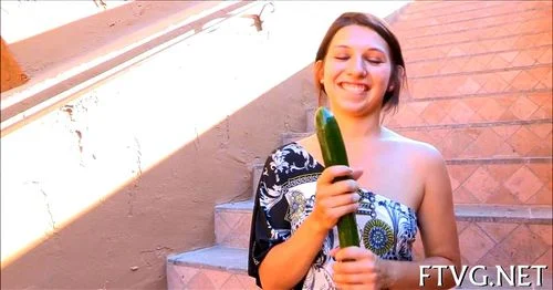 Cucumber in her vagina