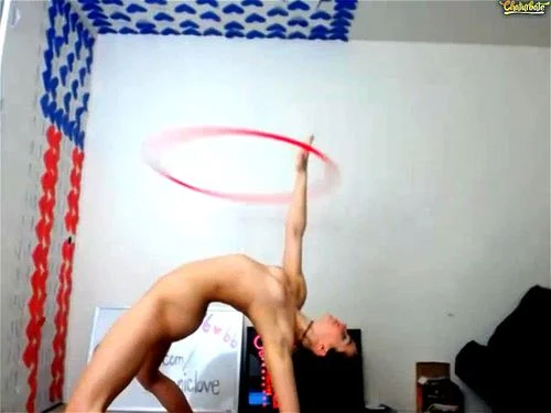 chroniclove - Hula girl works the hula-hoop while stripping!