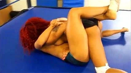 Two sweaty ebonies chics wrestling