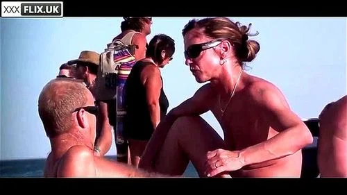 tanned white busty milf blows husband on the beach in front of everybody