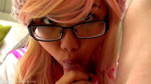 Asian blowing her friend in pink cosplay outfit