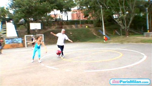 Huge natural boobed playing basketball