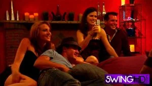 Swinger couples enjoy red room orgy