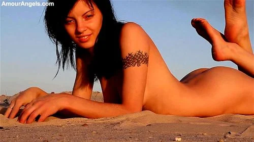 striptease, on the beach, solo, unknown