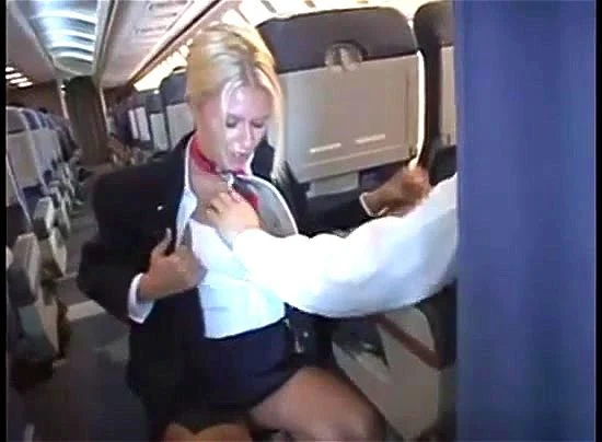 Handjob in airplane with sexy stewerdess