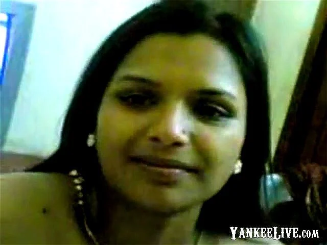 Sexy mature indian lady shows of her nice tits and teasing on webcam Sexy mature indian lady shows of her nice tits and teasing on webcam