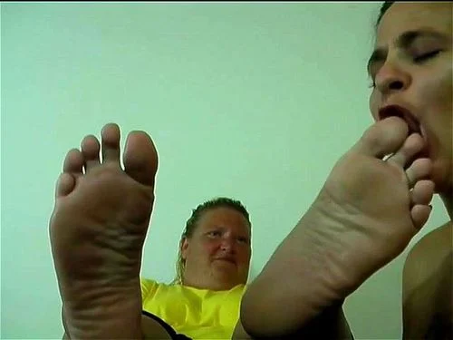 Sniff and lick feet soles