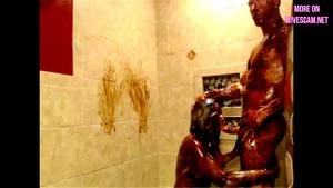 Fitness couple chocolate shower