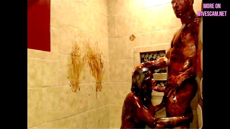 Fitness couple chocolate shower