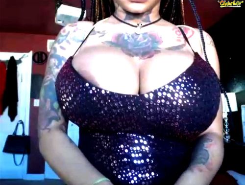 tatted chic doing cam show