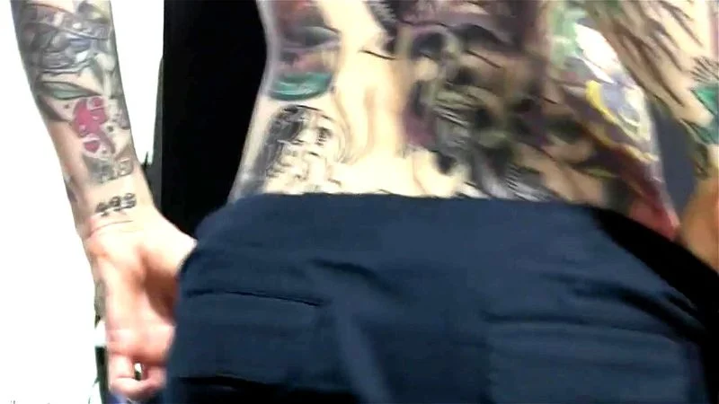 The most impressive tatooed babe undressing The most impressive tatooed babe undressing