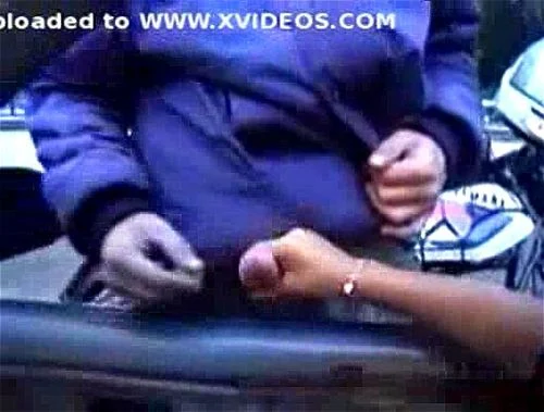 Handjob in the car, in the middle of the street