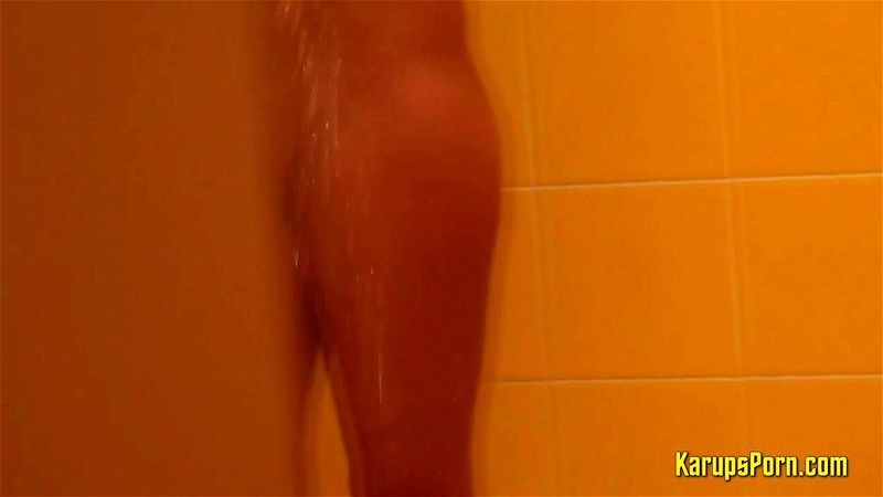 Curvy amateur chick filmed at shower