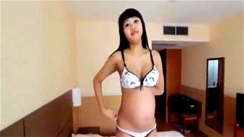 Sexy pregnant Asian takes white creampie