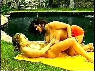 Big tit lesbians in pool