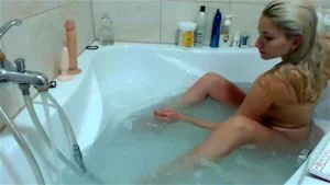 big tit babe takes a bath