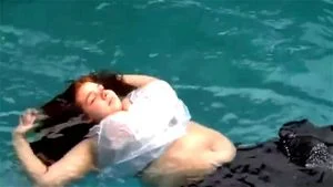 Enormous boobs swimming