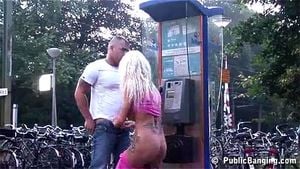 MILF-gets-tongued-and-injected-by-the-payphone