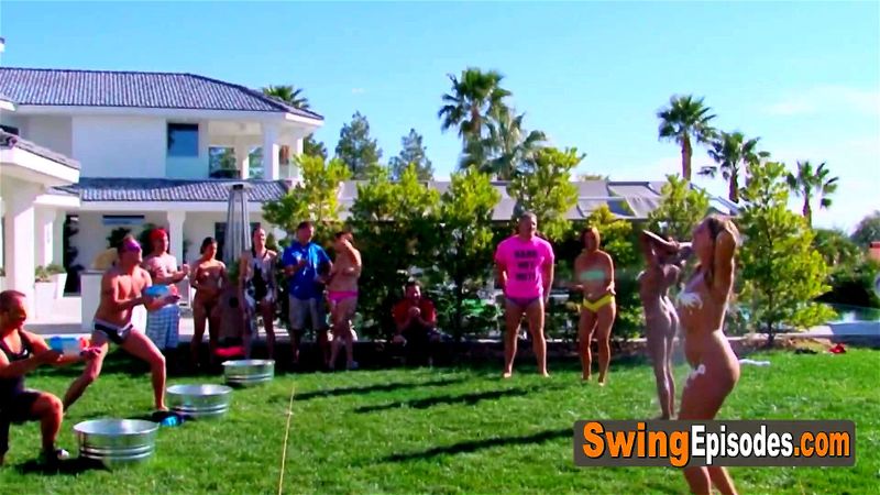 Swinger couples play steamy games at the backyard with each other