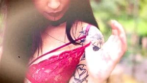 this sexy and tattooed webcam model likes to undress in public