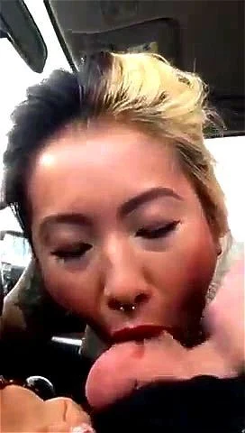 asian chick gives a blowjob for a ride home