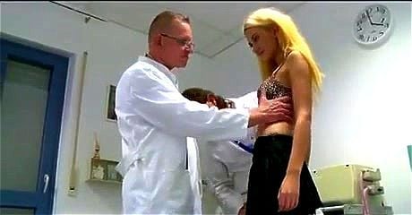 Husband waits while wife is examined
